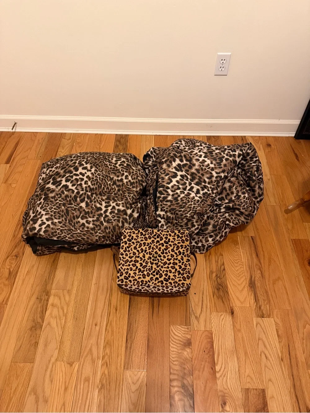 Leopard Print twin bedspread 2 of them come with this bundle and a Brown case